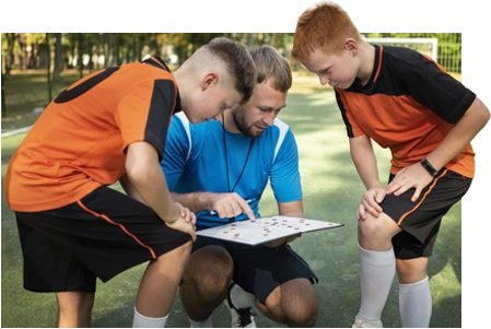 coach showing game plan to players