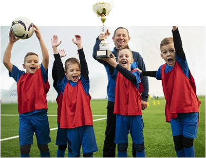 boys celebrating their trophy win