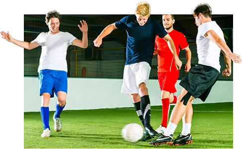 four men playing football